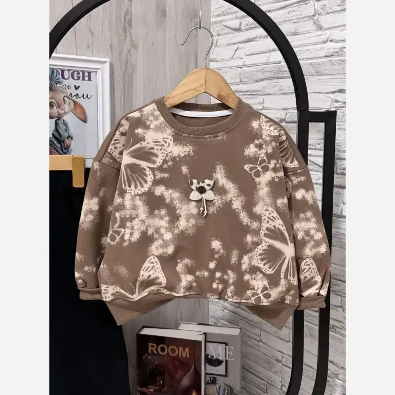 ست بلوز و شلوار دخترانه طرح پروانه جنس دورس لاکرا رنگ کرم سفید شکلاتی سایز 45 تا 65 - تصویر 8